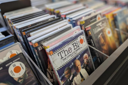 stacked collection of DVDs